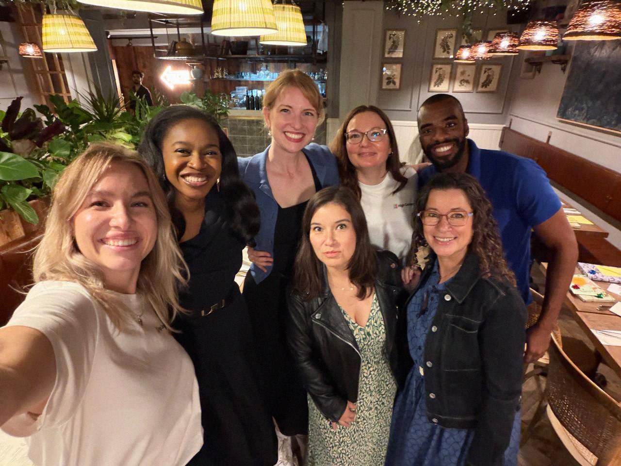 High Context community members smiling together at a London meetup